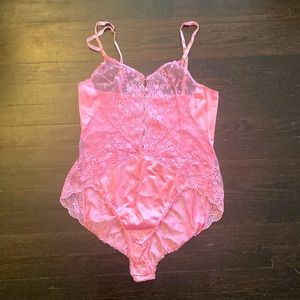 Vintage Vanity Fair lingerie bodysuit in hot pink with mesh/lace details.